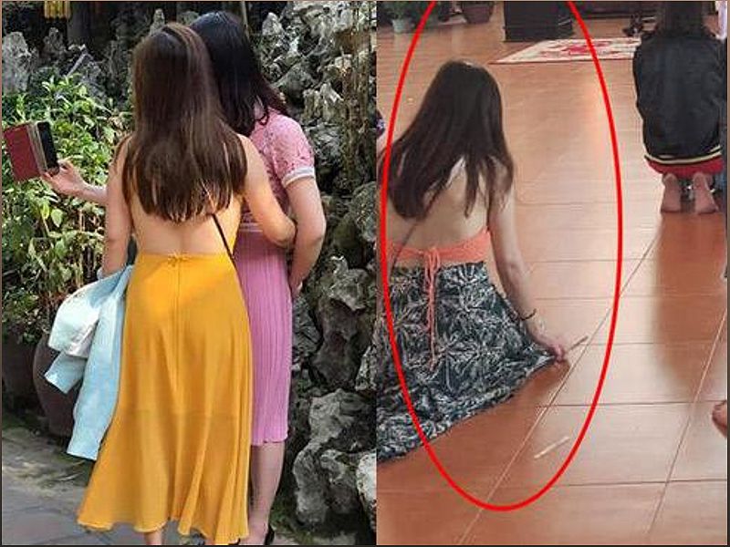 Cô gái gây tranh cãi khi mặc váy hở lưng đi lễ chùa - -1610743261